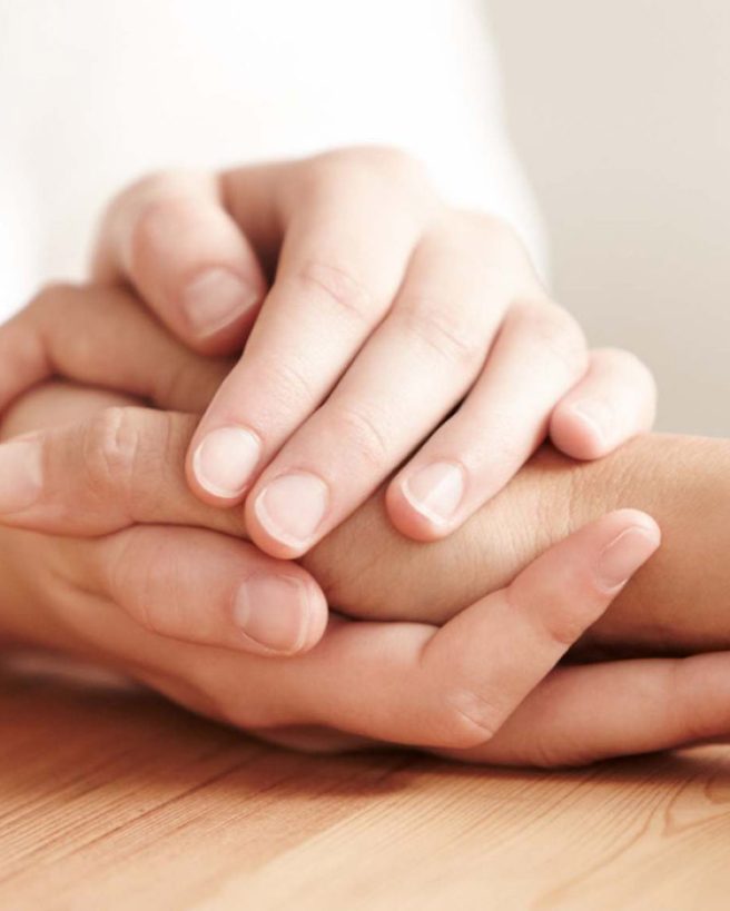 University, students and diversity friends hug at campus in support, motivation and happiness together in education, studying and learning. Happy, excited and young college people group in solidarity.